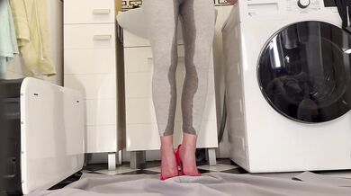 Milf leggins soak through as desperation forces pee gush down red heels