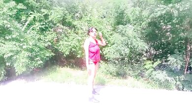 Motorcycle biker ebony goddess teases and yoga stretches in the park for hungry eyes
