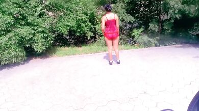 Motorcycle biker ebony goddess teases and yoga stretches in the park for hungry eyes