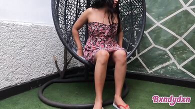 Watch this latina in a sexy dress touch herself raw under her dress