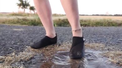 Light-colored tights ruined by beach puddles
