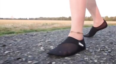 Light-colored tights ruined by beach puddles