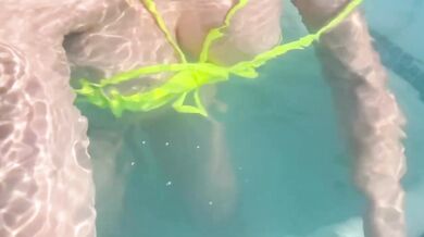 Sexy Italian Milf Artemisia flashes her juicy big tits in public pool water