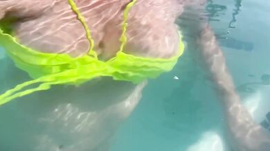 Sexy Italian Milf Artemisia flashes her juicy big tits in public pool water