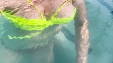 Sexy Italian Milf Artemisia flashes her juicy big tits in public pool water