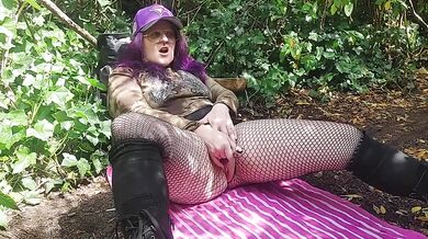 Naughty milf fingers herself in the forest till her pussy drips dirty talk