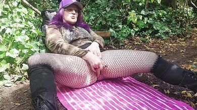 Naughty milf fingers herself in the forest till her pussy drips dirty talk