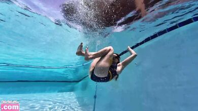 Barefoot teen scuba tank solo rolling girl under water fit challenge