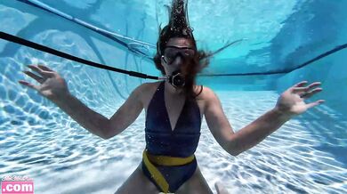 Barefoot teen scuba tank solo rolling girl under water fit challenge