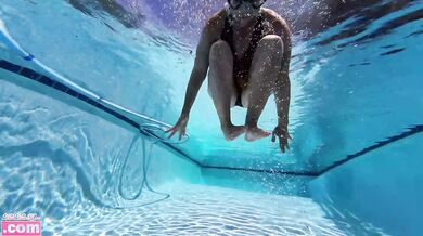 Barefoot teen scuba tank solo rolling girl under water fit challenge