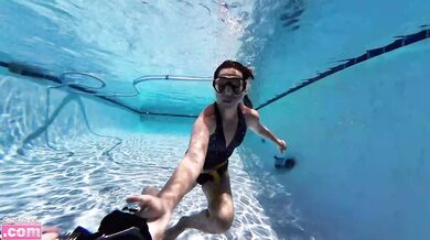 Barefoot teen scuba tank solo rolling girl under water fit challenge