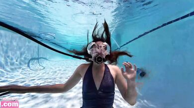 Barefoot teen scuba tank solo rolling girl under water fit challenge