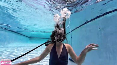 Barefoot teen scuba tank solo rolling girl under water fit challenge