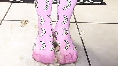 Big feet in socks squish and crush bananas while worshipping cum