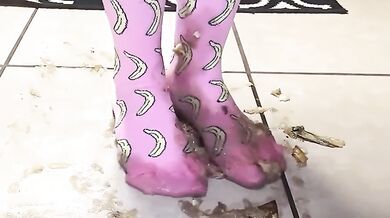 Big feet in socks squish and crush bananas while worshipping cum