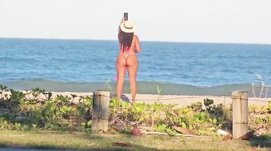 Duct tape micro bikini cameltoe slut flashes on beach without panties