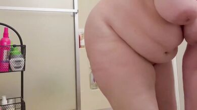 Shy MILF forced to strip for bodysuit try on with big tits and ass