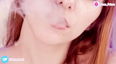 Vaping redhead tease strips naked for you