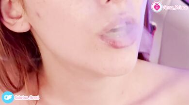 Vaping redhead tease strips naked for you