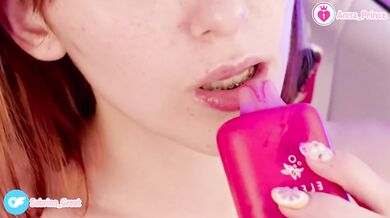 Vaping redhead tease strips naked for you