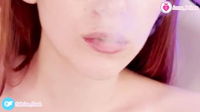 Vaping redhead tease strips naked for you