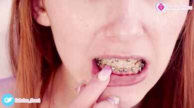 Vaping redhead tease strips naked for you