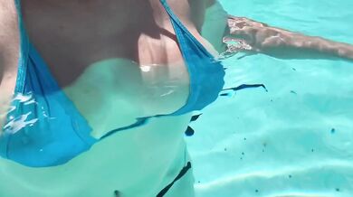 Italian gigantic natural tits squished in bikini pool water