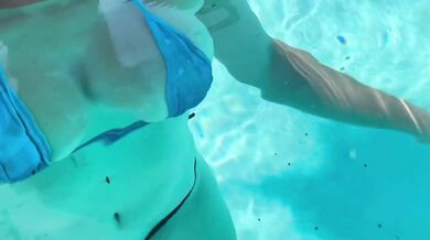 Italian gigantic natural tits squished in bikini pool water