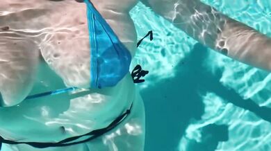 Italian gigantic natural tits squished in bikini pool water