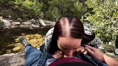 Sister in law deepthroats on riverbank gets almost caught