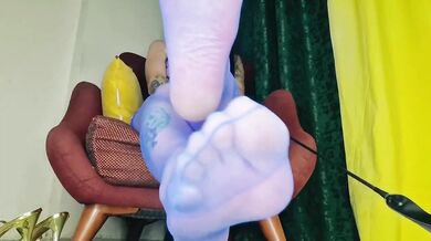 Feet worship in sheer blue stockings her soles on display