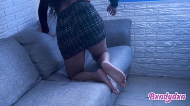 Latina in tight miniskirt teases you on the sofa pov