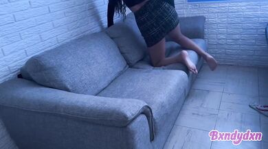 Latina in tight miniskirt teases you on the sofa pov