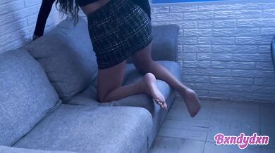 Latina in tight miniskirt teases you on the sofa pov