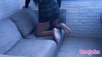 Latina in tight miniskirt teases you on the sofa pov