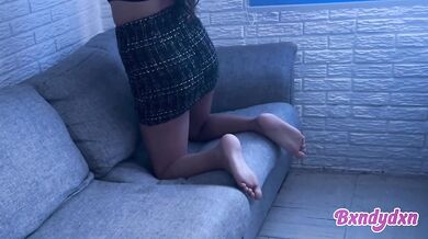 Latina in tight miniskirt teases you on the sofa pov