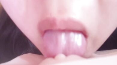 Japanese woman licking and rubbing her shaped toy to climax