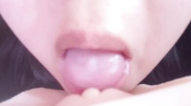 Japanese woman licking and rubbing her shaped toy to climax