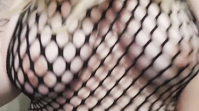 Blonde curvy goddess rides POV in netted shirt with massive tits bouncing
