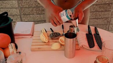 August Skye whips up naughty Coconut Cocktails slurping solo till glass drip