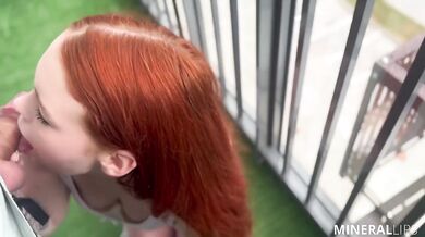 Red haired girl gets on knees publicly deepthroats then takes creampie on loggia