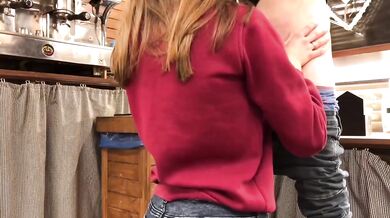 Teen whore gets caught sucking cock under bar counter at work