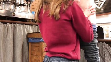 Teen whore gets caught sucking cock under bar counter at work