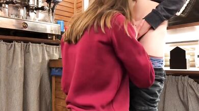 Teen whore gets caught sucking cock under bar counter at work
