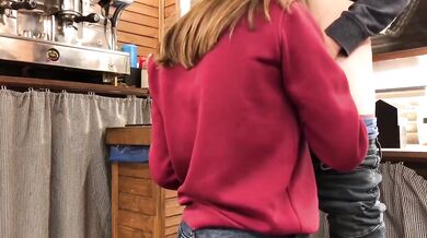 Teen whore gets caught sucking cock under bar counter at work
