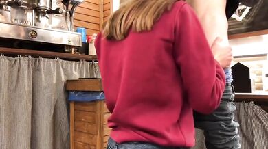 Teen whore gets caught sucking cock under bar counter at work
