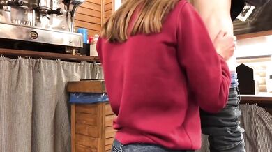 Teen whore gets caught sucking cock under bar counter at work
