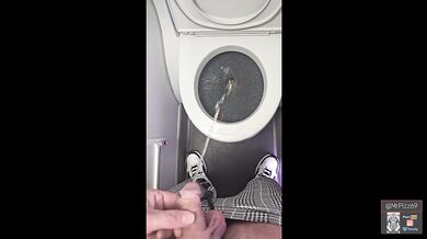 Taking a piss on a plane at a mile high
