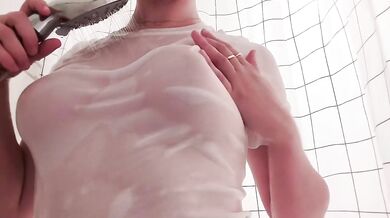 18 Year Old Girl Takes Shower and Fingerbangs Her Big Tits Until She Cums Hard
