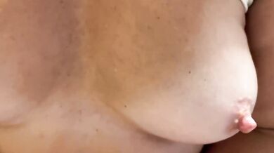 Busty blonde tears veggies while wiggling pink panties in tight white tank